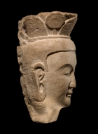 A LIMESTONE HEAD OF A BODHISATTVA