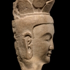 A LIMESTONE HEAD OF A BODHISATTVA