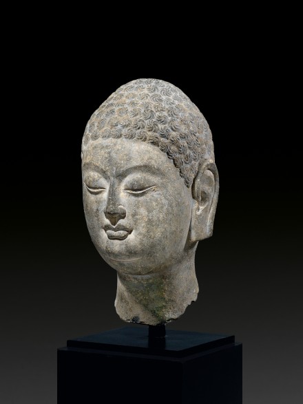 A LIMESTONE HEAD OF BUDDHA / . Lally & Co., Oriental Art / New York  City, New York