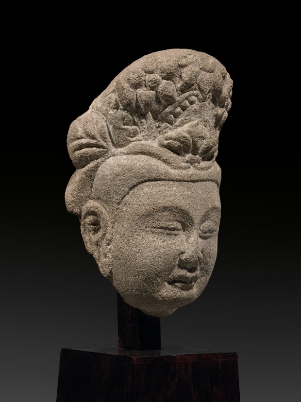 A SANDSTONE HEAD OF A BODHISATTVA