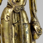 A GILT BRONZE FIGURE OF AVALOKITESVARA