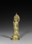 A GILT BRONZE FIGURE OF AVALOKITESVARA