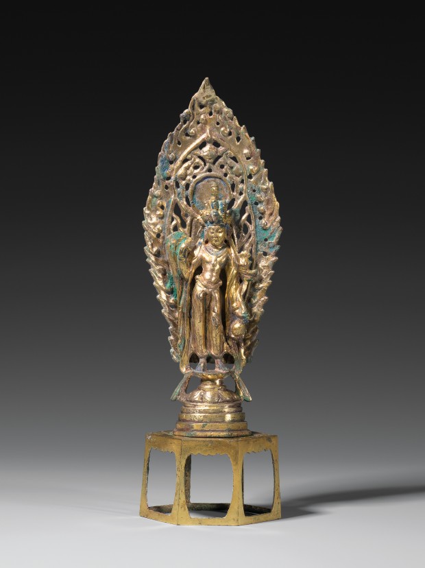 A GILT BRONZE FIGURE OF ELEVEN-HEADED GUANYIN