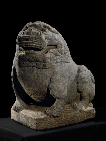 A MASSIVE LIMESTONE GUARDIAN LION