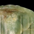 A NEOLITHIC JADE BIRD FORM PENDANT