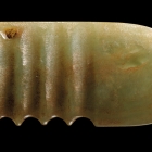 A NEOLITHIC JADE OBLONG PENDANT