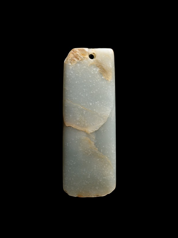 A NEOLITHIC JADE CEREMONIAL AXE (CHAN)