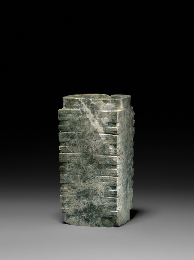 A NEOLITHIC MOTTLED GREEN JADE CONG