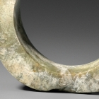 A NEOLITHIC JADE BRACELET (ZHUO)