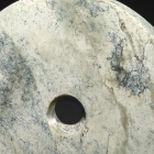 A NEOLITHIC CLOUDY GRAY-GREEN JADE DISC (BI)