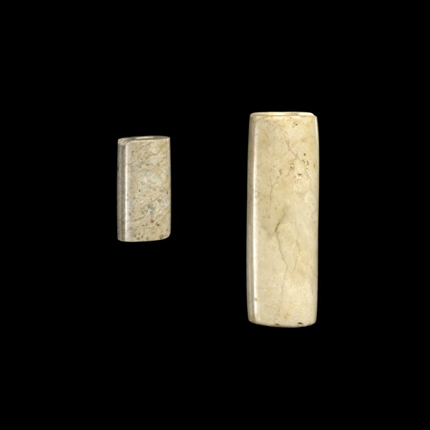 TWO TUBULAR NEOLITHIC JADE BEADS