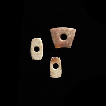 THREE SMALL NEOLITHIC JADE ORNAMENTS