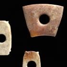 THREE SMALL NEOLITHIC JADE ORNAMENTS