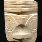 A NEOLITHIC JADE MASK-FORM ORNAMENT