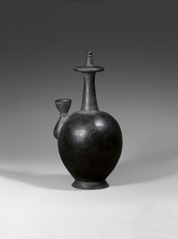 A BURNISHED BLACK POTTERY BUDDHIST RITUAL VESSEL (KUNDIKA)