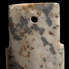 AN ARCHAIC MOTTLED STONE DAGGER-AXE (GE)