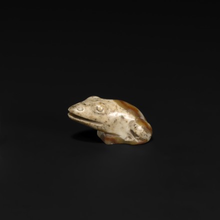 A SMALL ARCHAIC JADE FROG