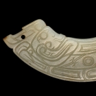 AN ARCHAIC JADE TWIN DRAGONS PENDANT (HUANG)