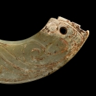 AN ARCHAIC JADE TWIN DRAGONS PENDANT (HUANG)