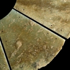 A LARGE SEGMENTED ARCHAIC JADE DISC (BI)