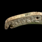 AN ARCHAIC JADE ORNAMENTAL FITTING