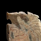 AN ARCHAIC JADE BIRD PENDANT