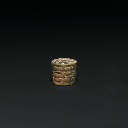 A SMALL ARCHAIC JADE FINIAL