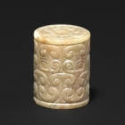 AN ARCHAIC JADE BEAD