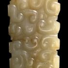 AN ARCHAIC JADE LONG PENDANT