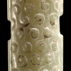 AN ARCHAIC GREEN JADE LONG PENDANT