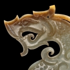 A JADE DRAGON PLAQUE FRAGMENT