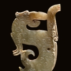 A PAIR OF ARCHAIC JADE DRAGON PENDANTS