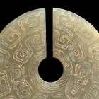 A PAIR OF ARCHAIC JADE SLIT DISCS (JUE)