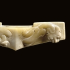 AN ARCHAIC JADE SWORD GUARD (GE)