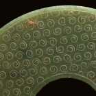 AN ARCHAIC JADE DISC (BI)