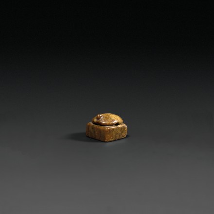 AN ARCHAIC BROWN JADE TORTOISE SEAL