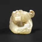 AN ARCHAIC JADE MINIATURE DRAGON FINIAL