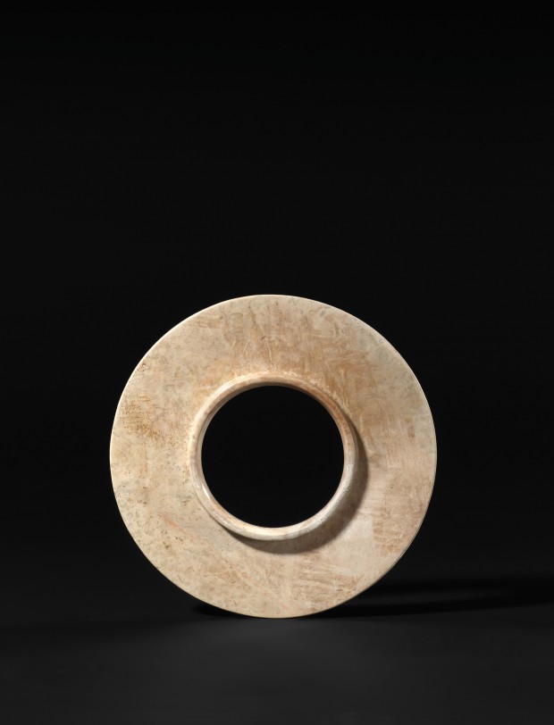 AN ARCHAIC JADE COLLARED DISC (YUAN)