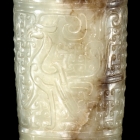 AN ARCHAIC JADE TWIN PHOENIX STEM CUP