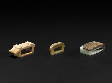 THREE ARCHAIC JADE BELT FITTINGS