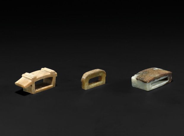 THREE ARCHAIC JADE BELT FITTINGS