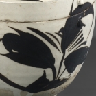 A PAINTED CIZHOU POTTERY JAR AND COVER