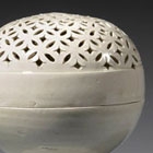 A GLAZED WHITE PORCELAIN OPENWORK CENSER