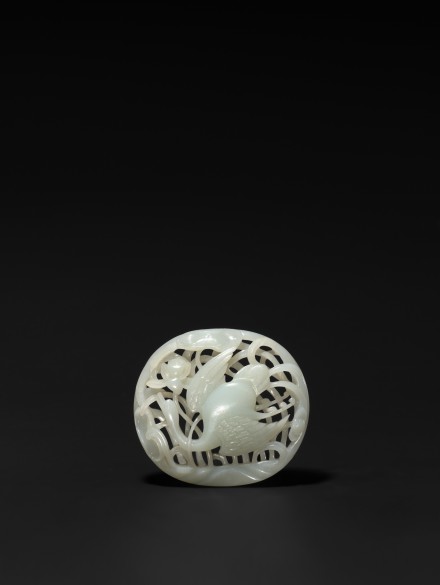 A WHITE JADE OPENWORK ‘GOOSE IN LOTUS’ PLAQUE