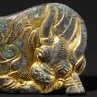 AN ORDOS GILT BRONZE BOVINE PLAQUE