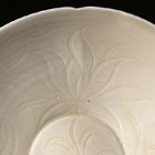 A CARVED DINGYAO WHITE PORCELAIN FOLIATE BOWL