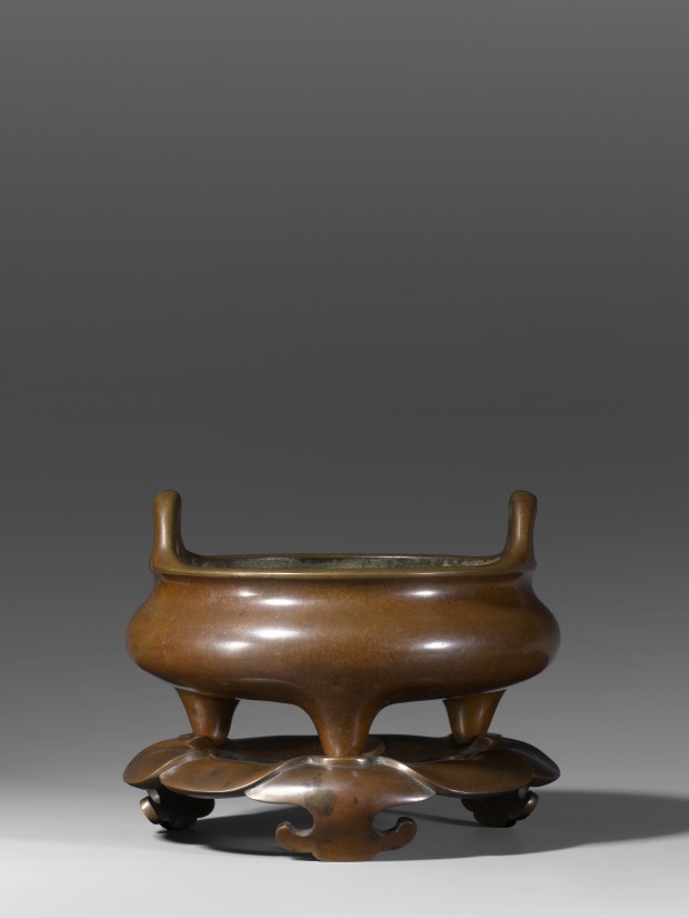 A BRONZE ‘GOLDEN MIST’ INCENSE BURNER AND STAND