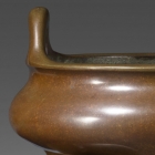 A BRONZE ‘GOLDEN MIST’ INCENSE BURNER AND STAND