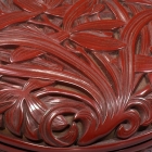 A SMALL CIRCULAR CINNABAR LACQUER BOX AND COVER