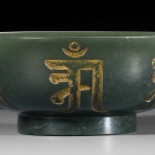 A GREEN JADE BUDDHIST ‘PURE WATER BOWL’